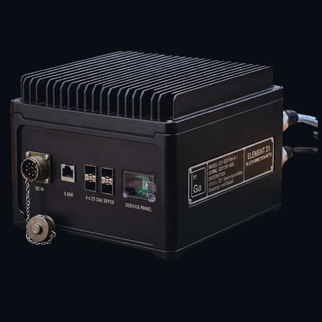 E31 appliance: sealed black chassis with a finned passive heatsink, locking DC input, 5 GbE and quad 25 GbE SFP28 ports, tamper-evident service panel, and the Element 31 nameplate.